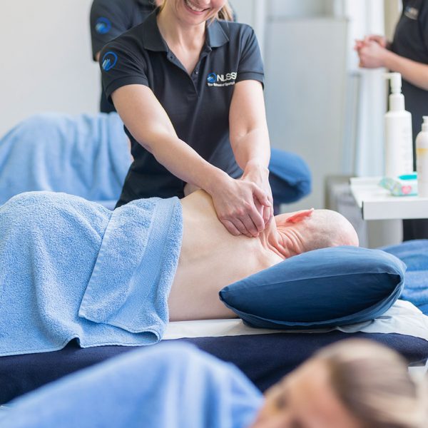 _ANH9068 student on NLSSM massage course practicing technique